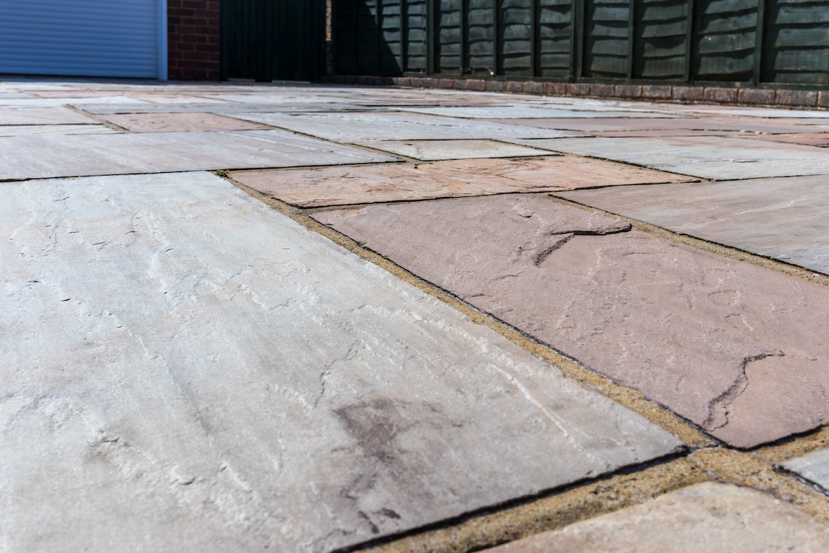 Indian sandstone paving on a domestic driveway, closeup