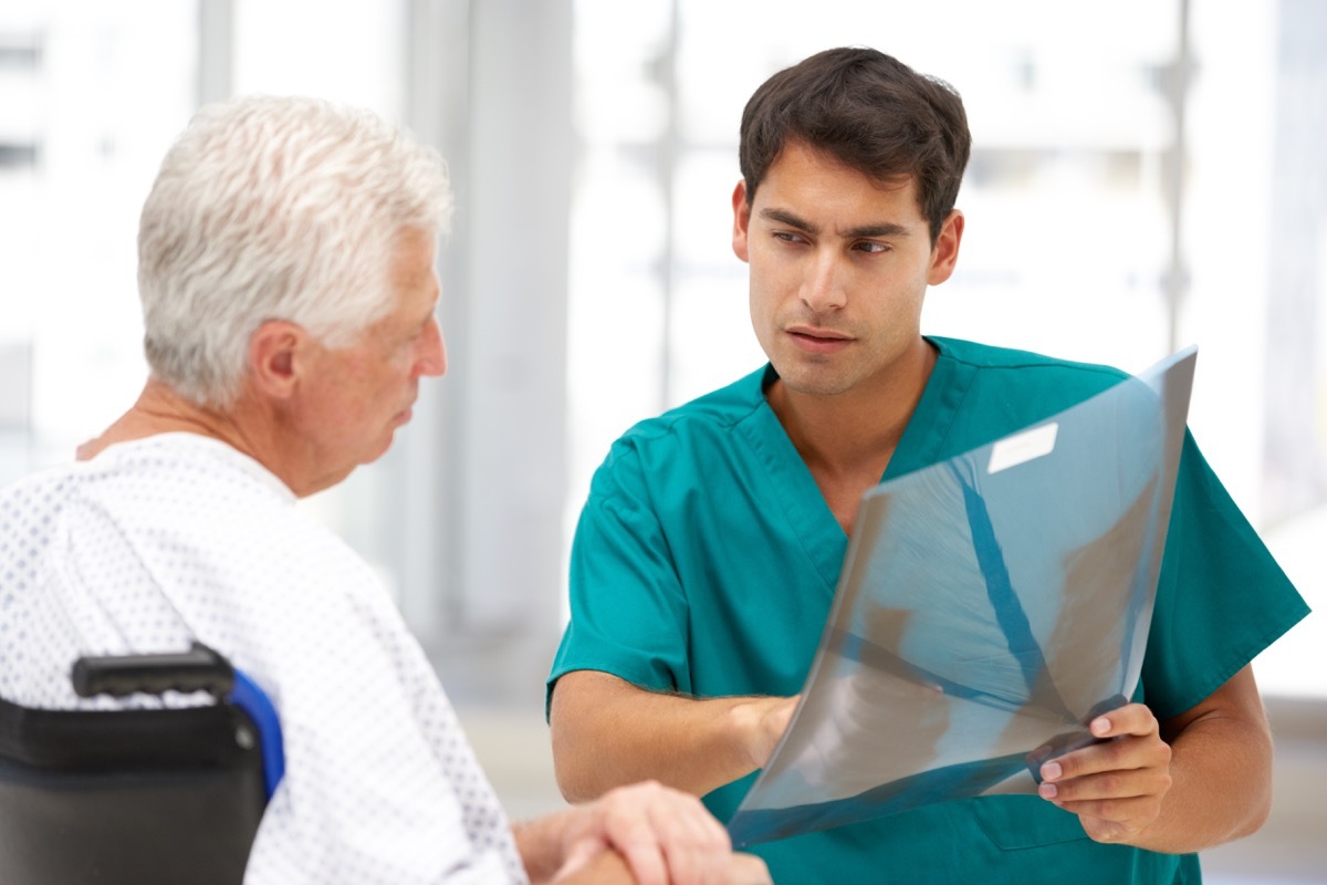 Doctor showing results to patient