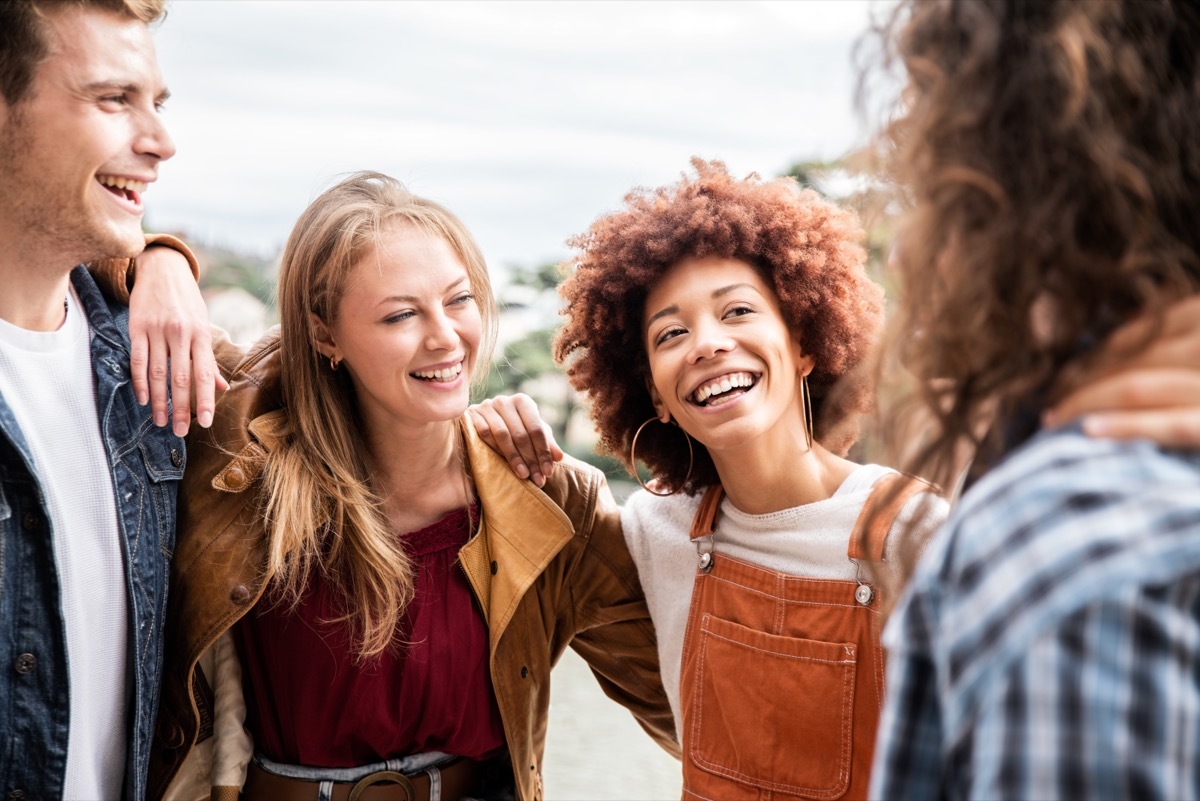 group of friends embracing