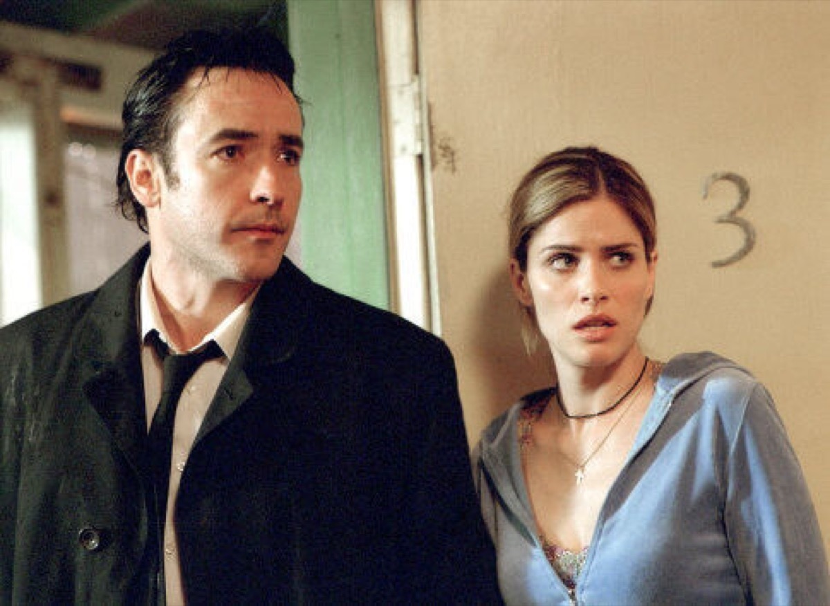 John Cusack and Amanda Peet in Identity (2003)