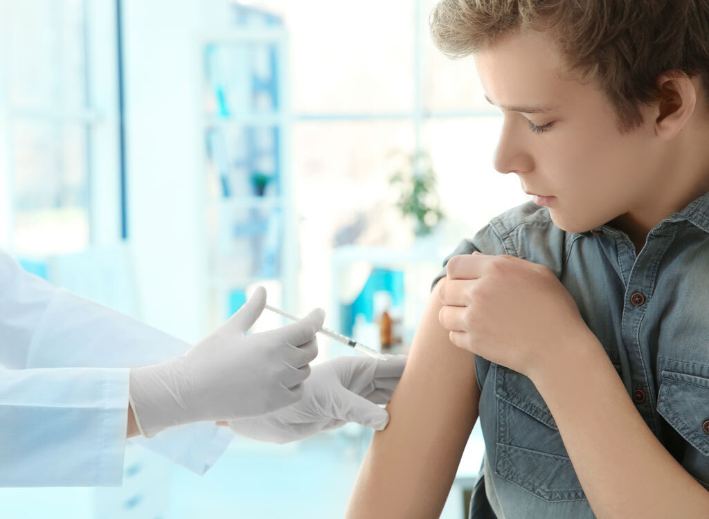 Boy getting flu shot