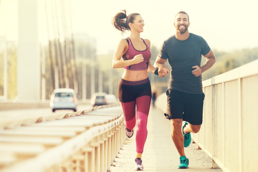 Man and woman running build muscle