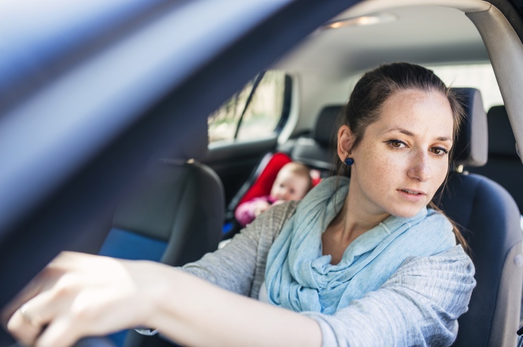 young woman driving Moms Should Never Say