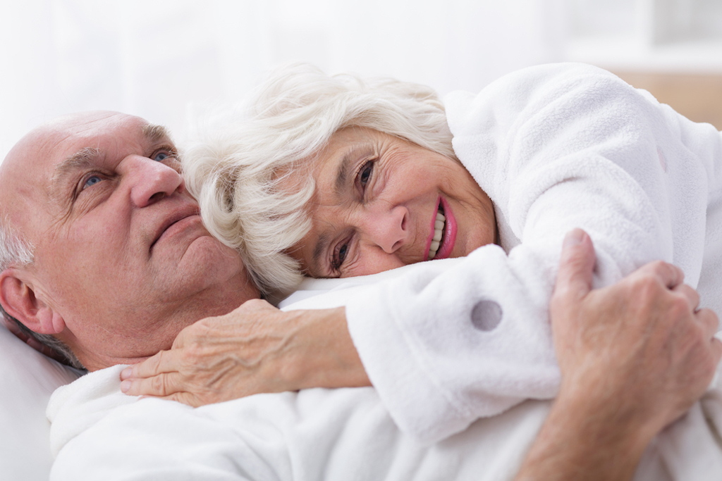 senior couple snuggling