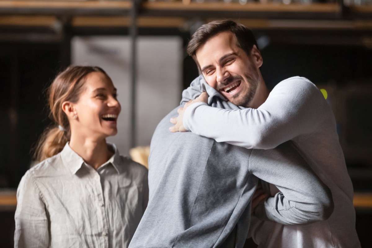 Three Friends Embracing