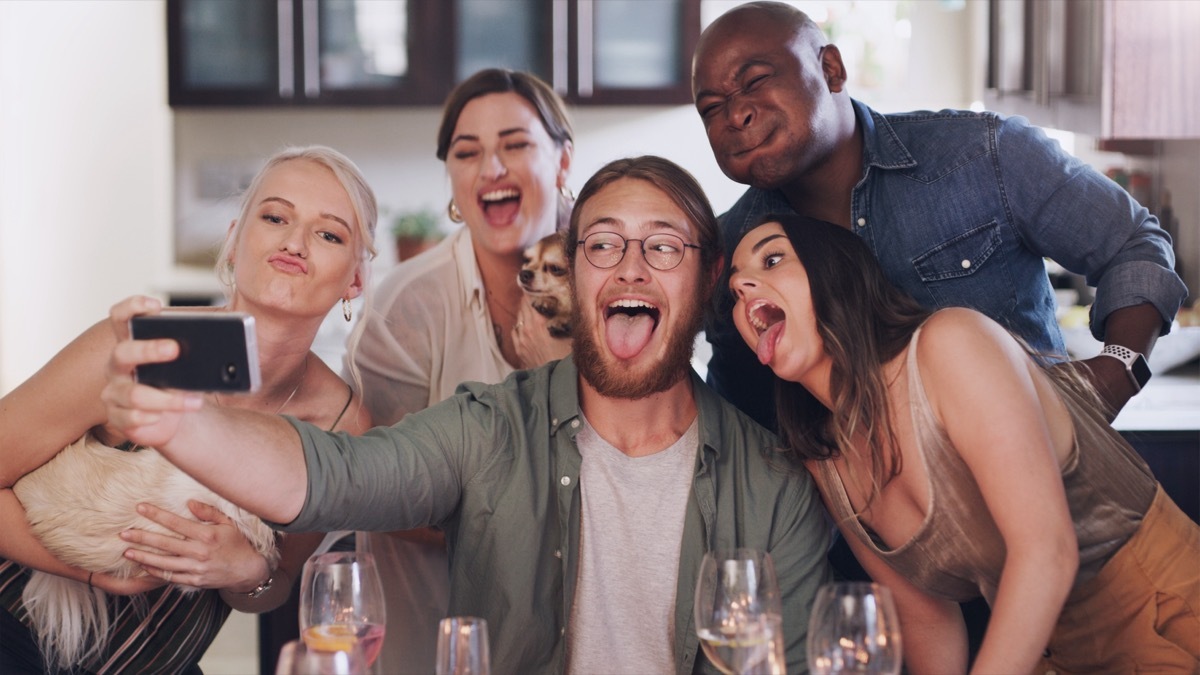 Group of People Taking a Silly Selfie