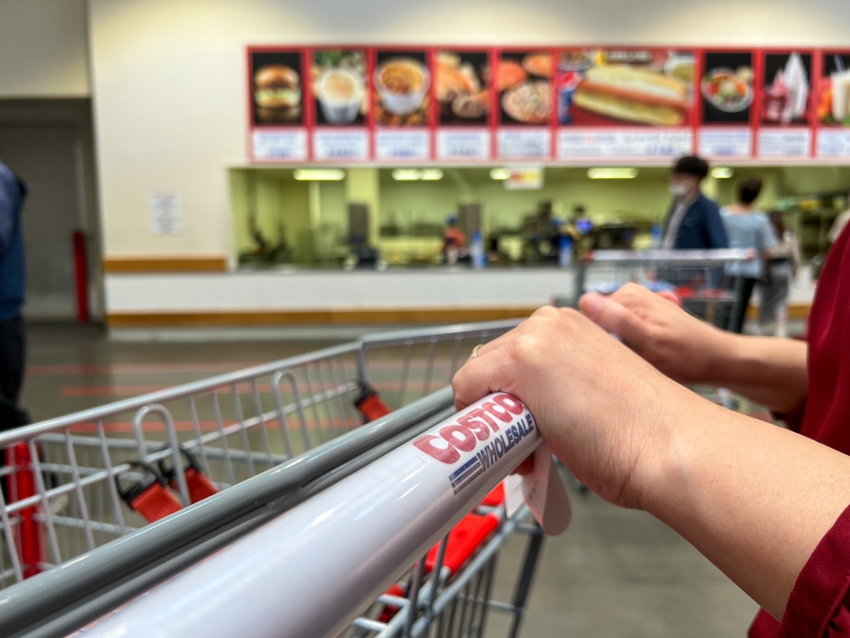 pushing shopping cart at costco