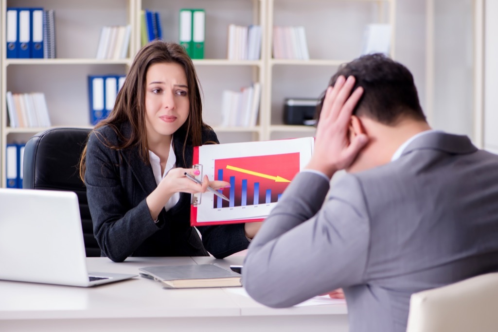 woman scorning man in office