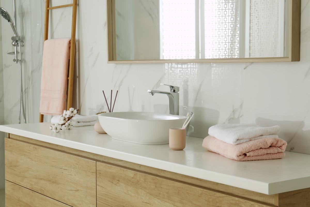 Pink accented bathroom decor