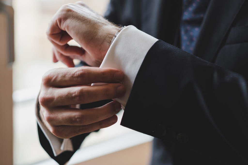 man in suit with cufflinks 