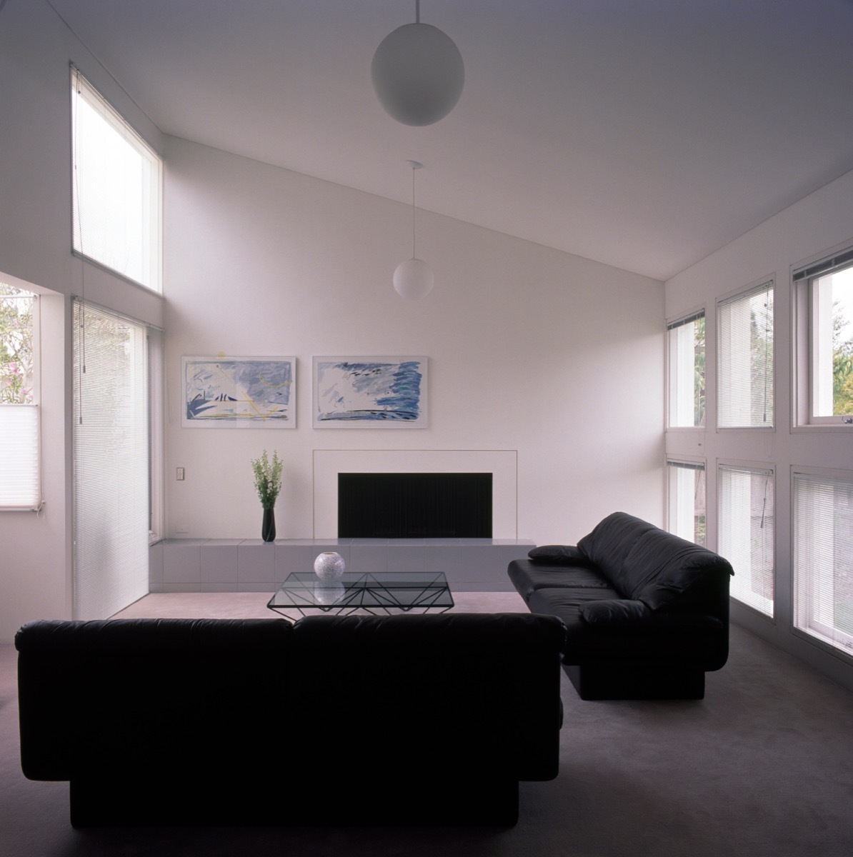  Black sofas in a minimalist style white living room