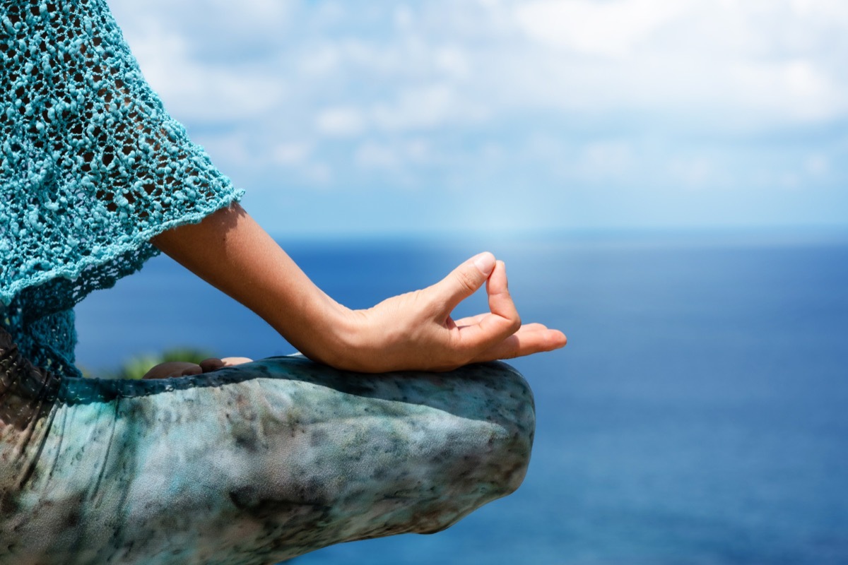 woman sitting in yoga pose