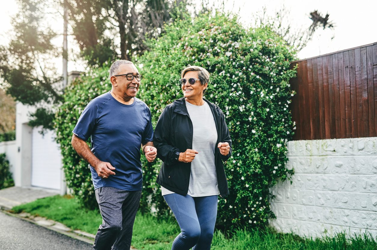 Two people jogging outdoors.