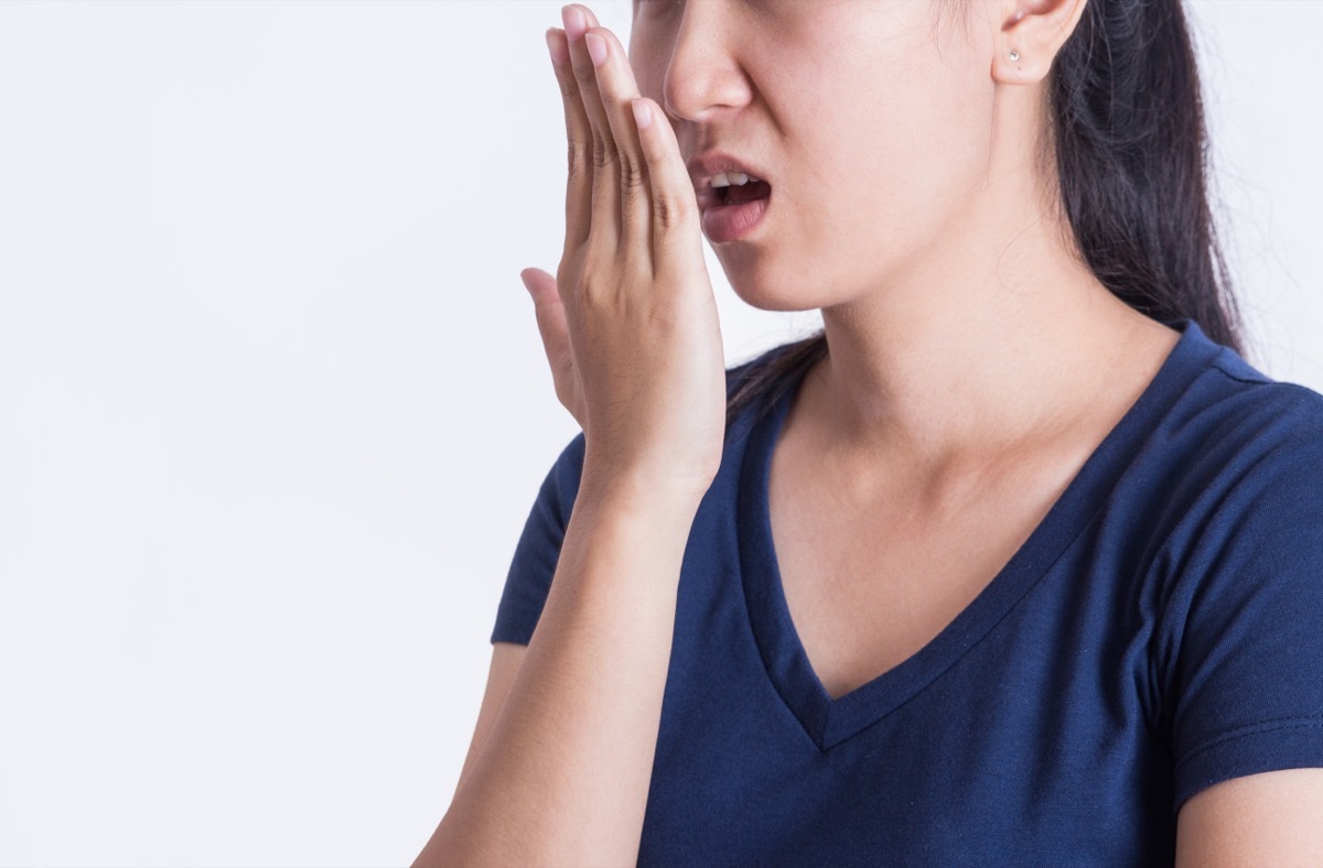 Woman Checking for Bad Breath