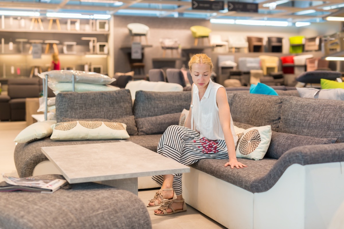 young woman furniture shopping