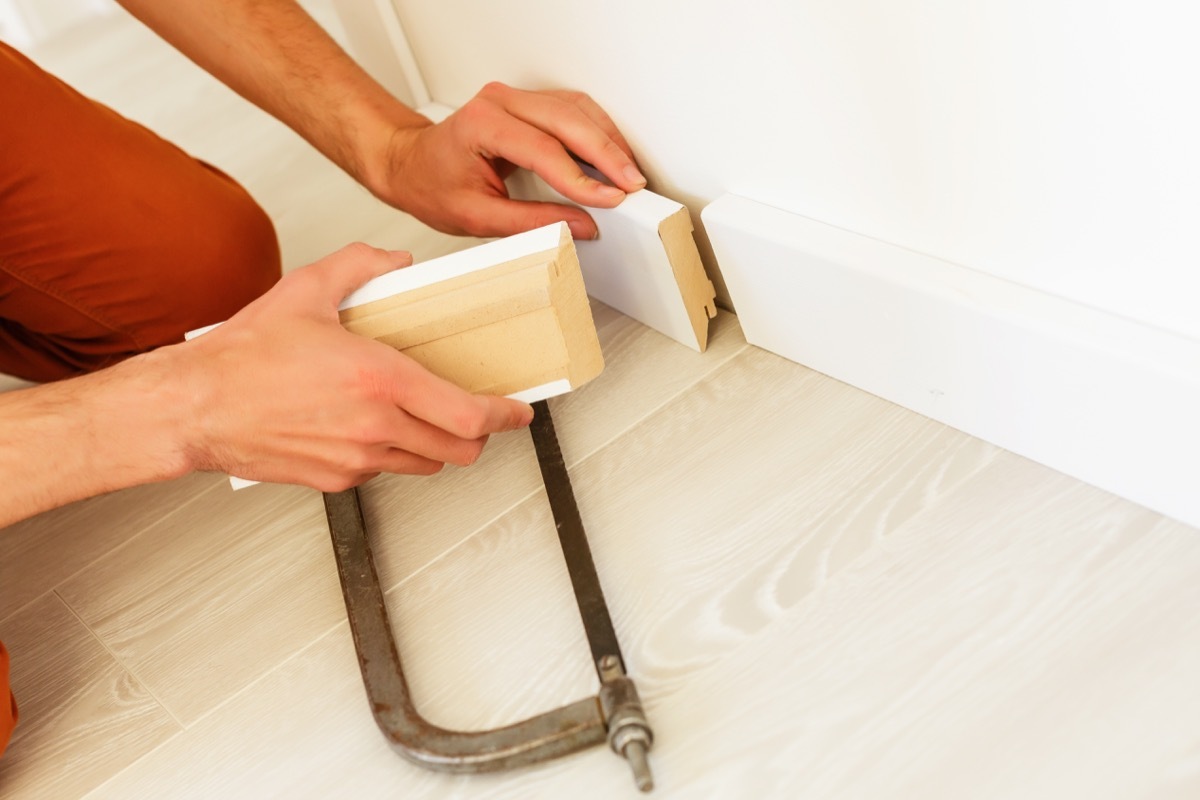 Installing the new skirting board after changing the parquet