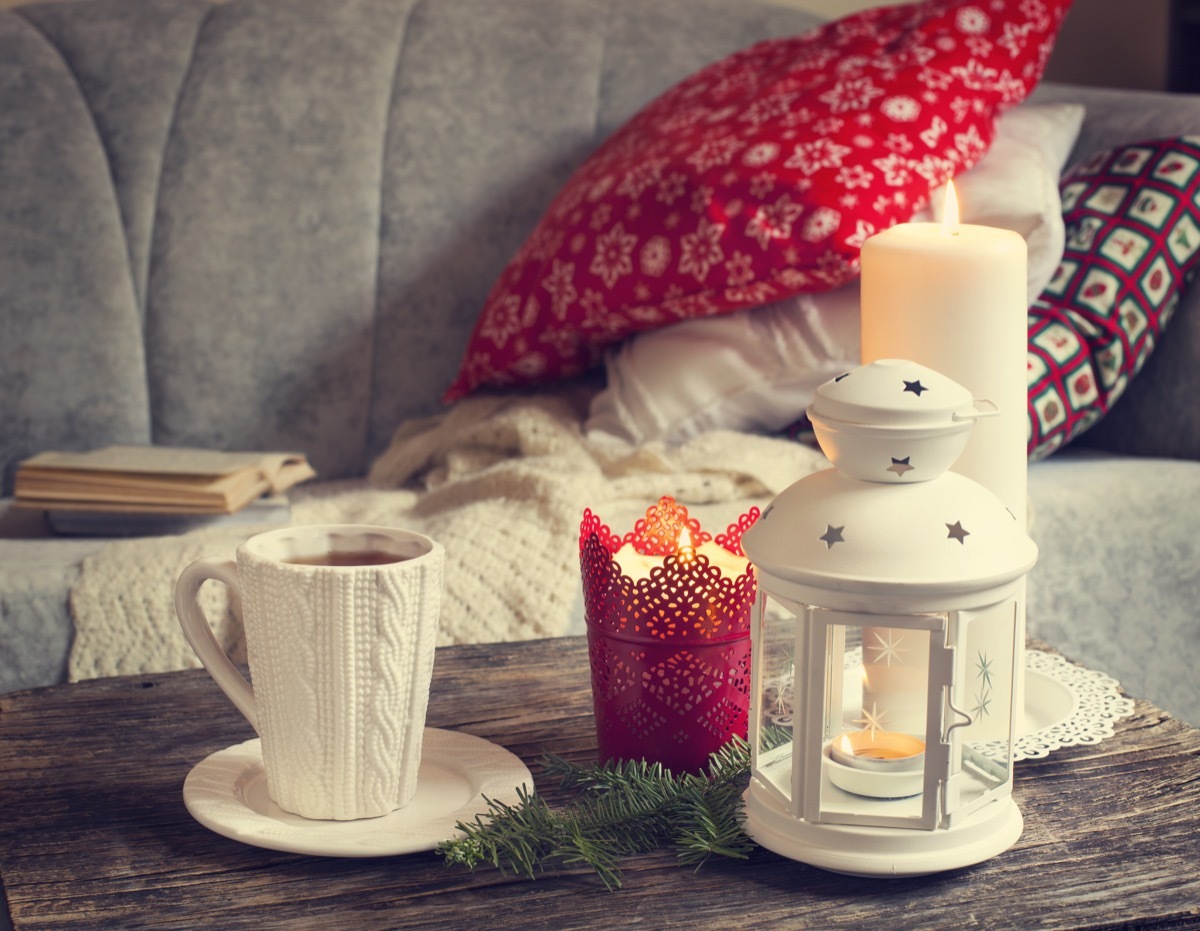 christmas pillow display with candles