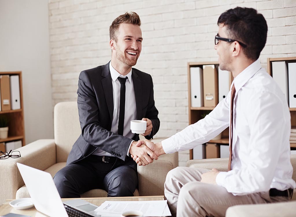 two men shaking hands