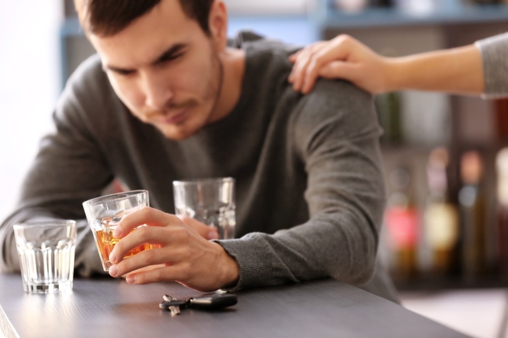 alcoholism and the brain - image of a man who can't stop drinking