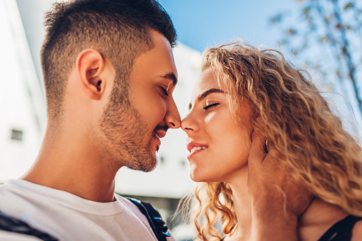 Young couple about to kiss.