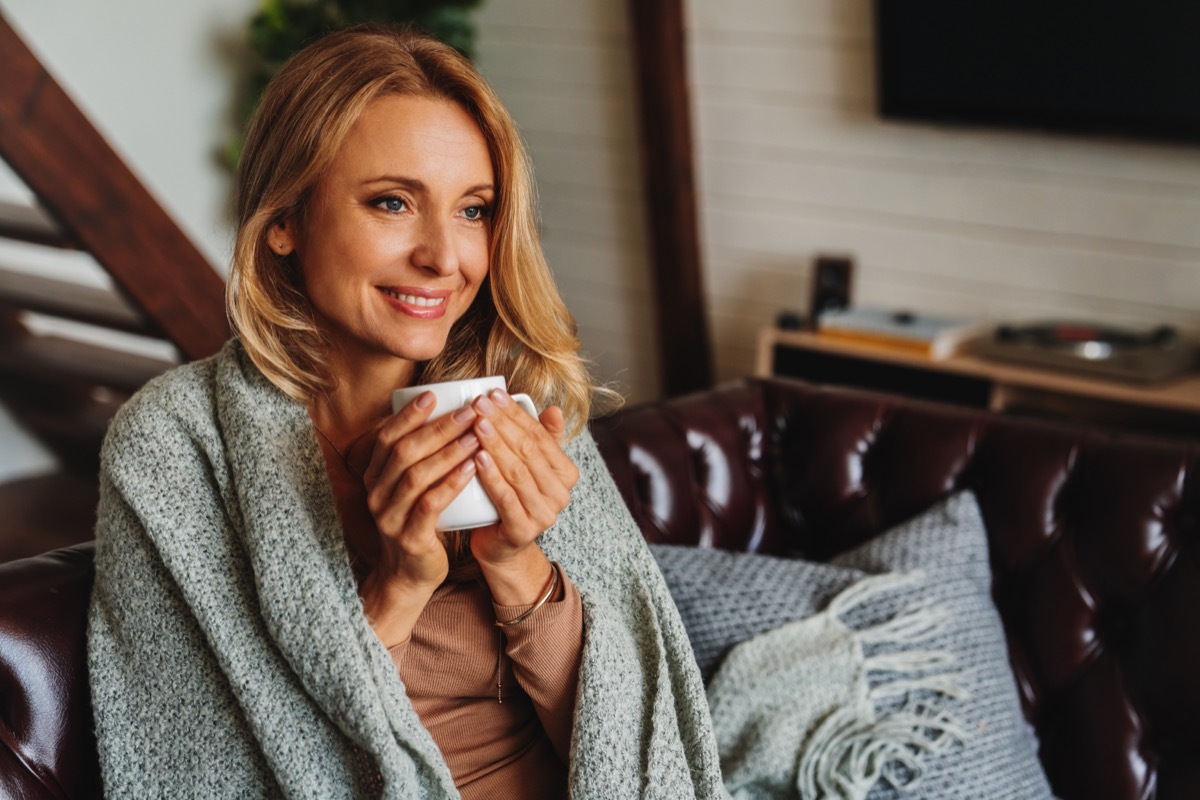 Woman Drinking Hot Beverage