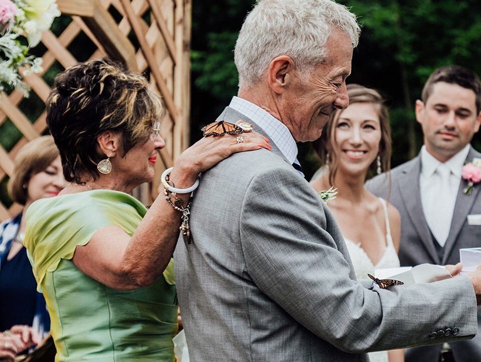 family releases butterflies at wedding in honor of late sister