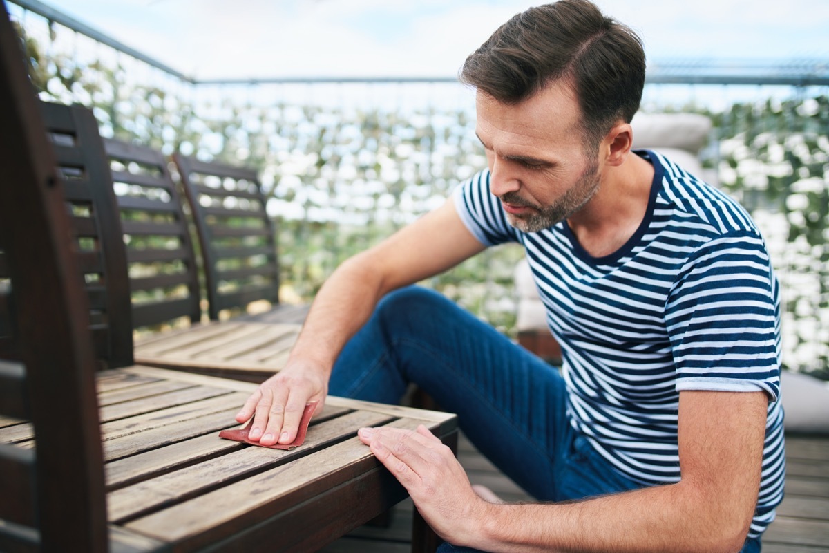 man working on furniture