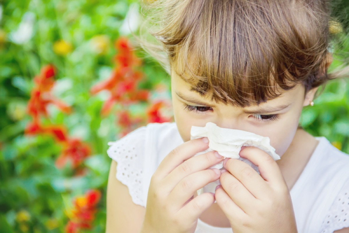 little girl blowing nose, parenting tips