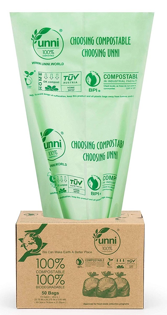 green trash bag coming out of brown box, earth friendly cleaning products