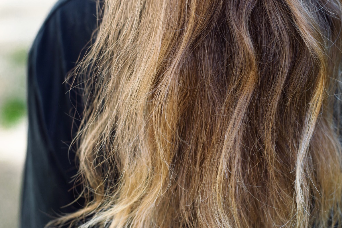 Long messy fragile women hair back look