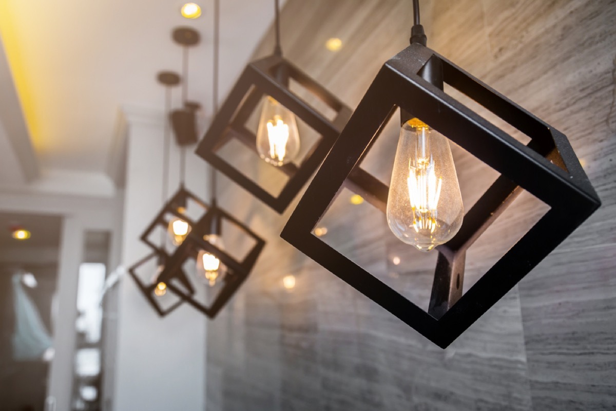 black cubic pendant lights with edison bulbs