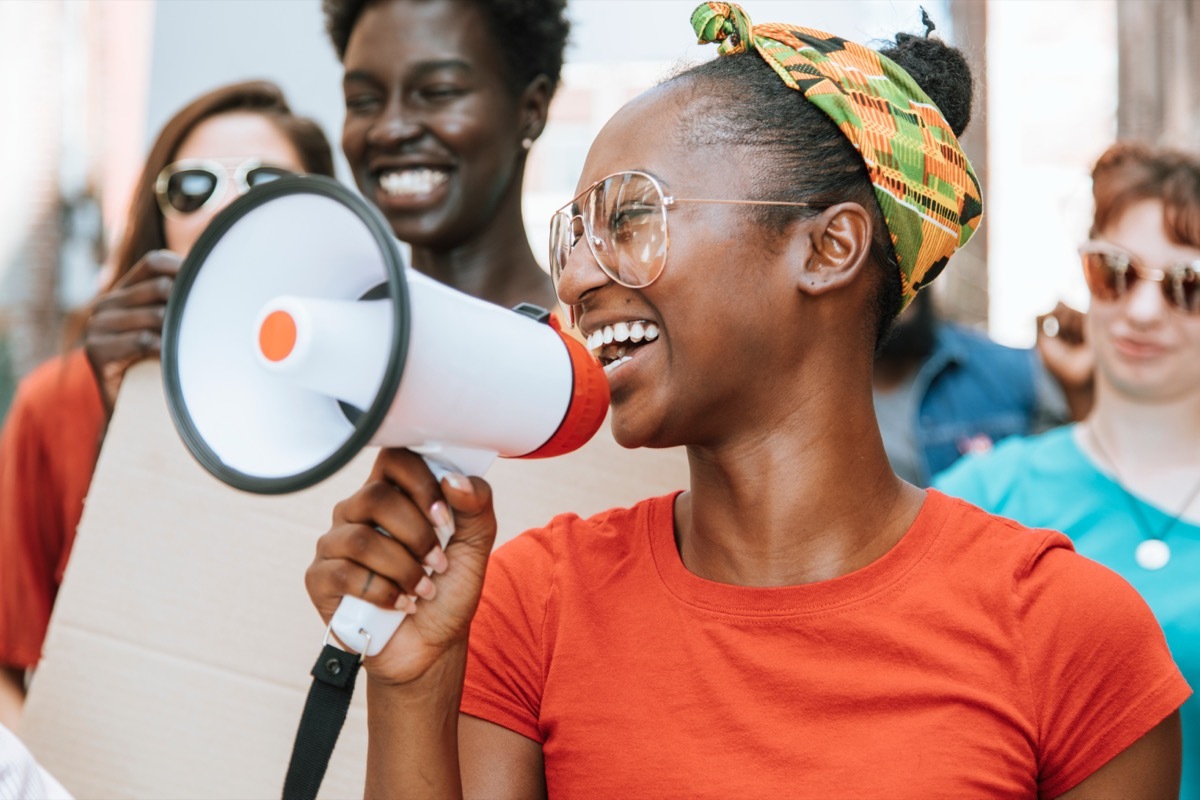 woman leading peaceful protest