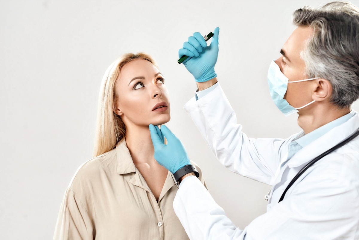 Woman receiving eye exam