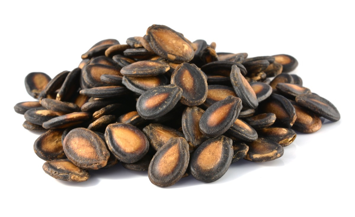 dry watermelon seeds on a white background