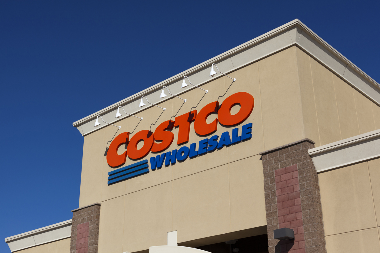 A close up of a Costco sign on a storefront