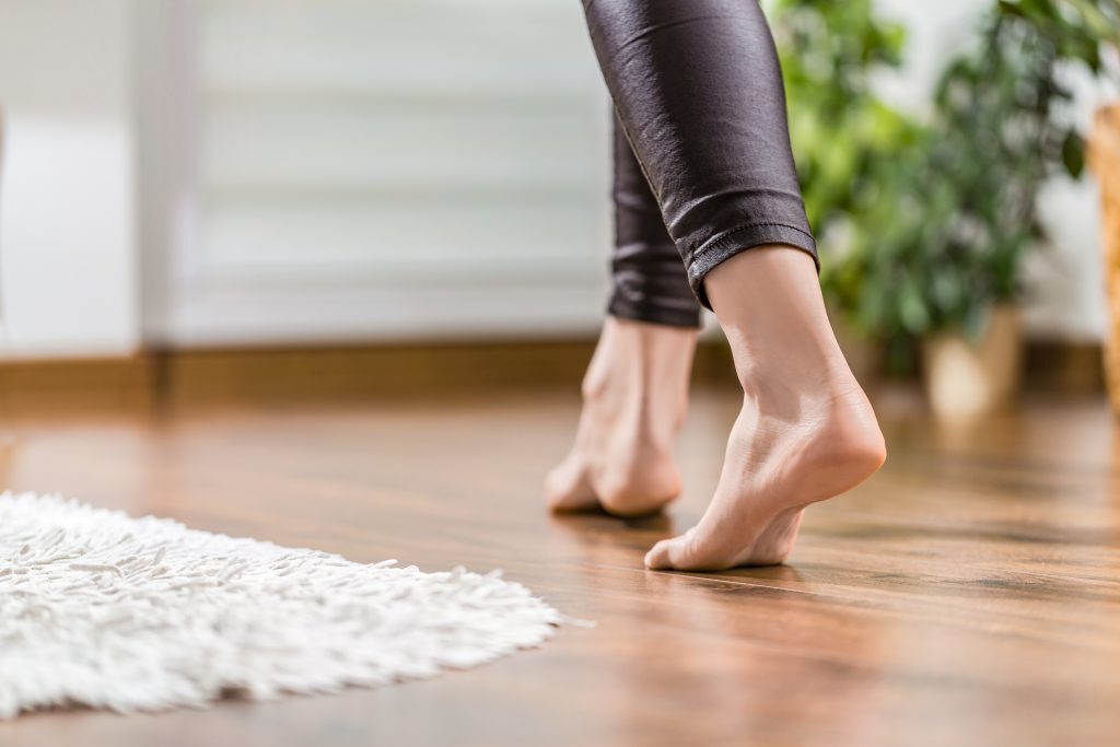 Woman Walking on Home Floor