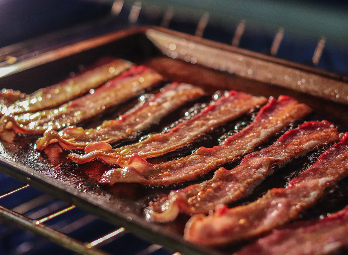 crispy bacon on a pan on grill