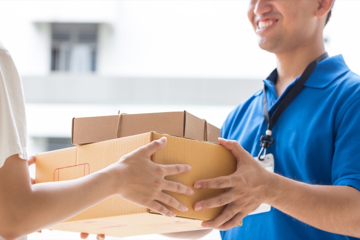 Asian man delivering packages