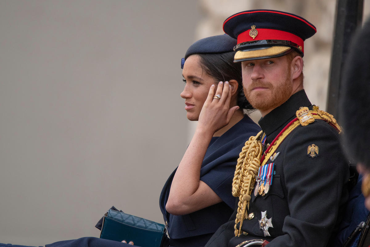 A Royal carriage arrives at Trooping the Colour with Royal Family members including Prince Harry and Meghan, Duke and Duchess of Sussex