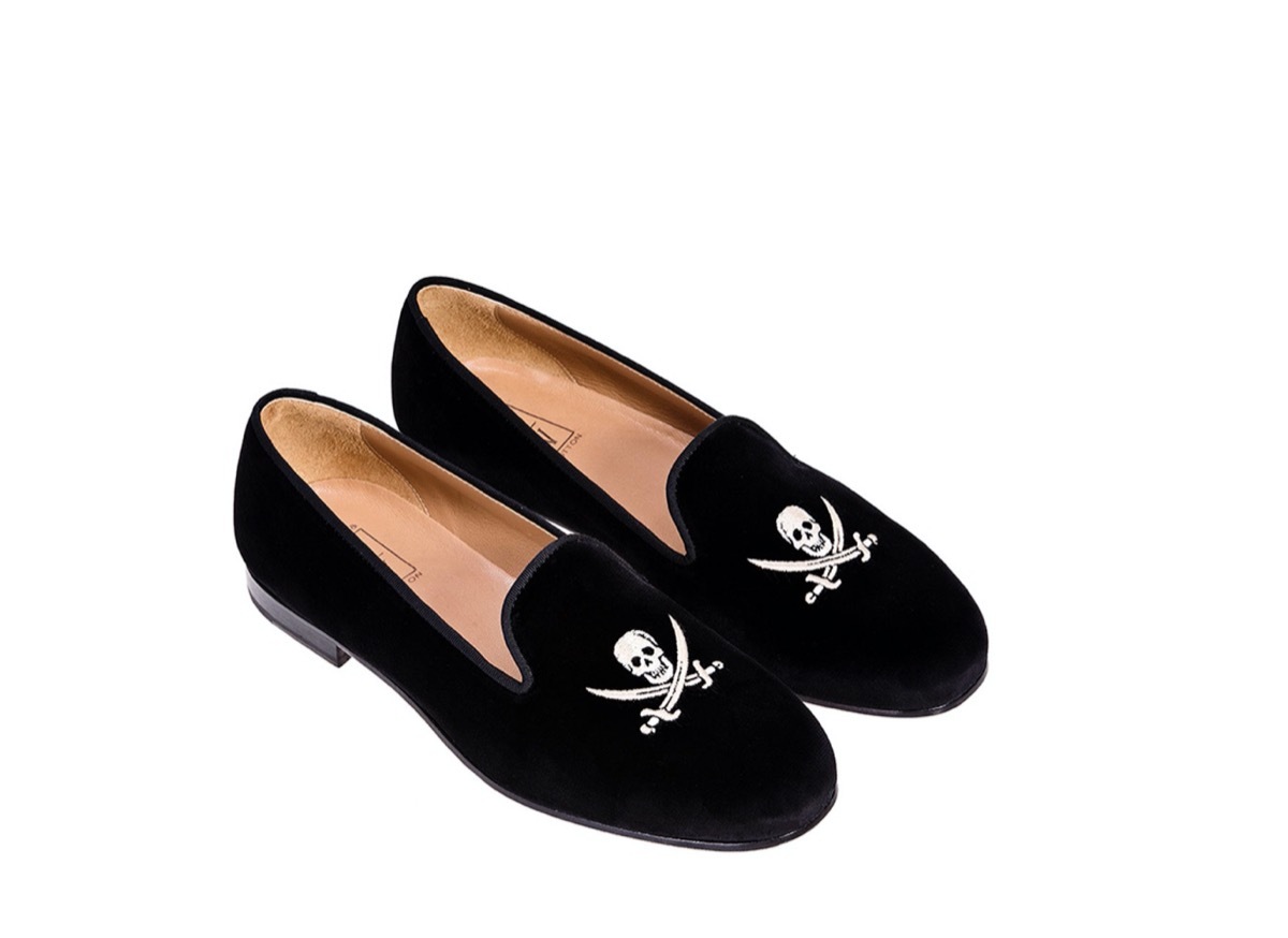 black velvet shoes with white skulls