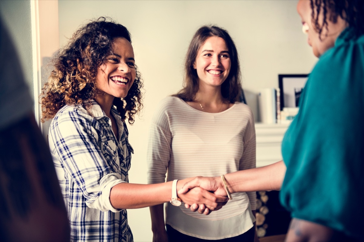 Women shaking hands getting introduced