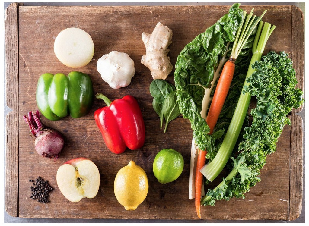 Whole foods on wooden board