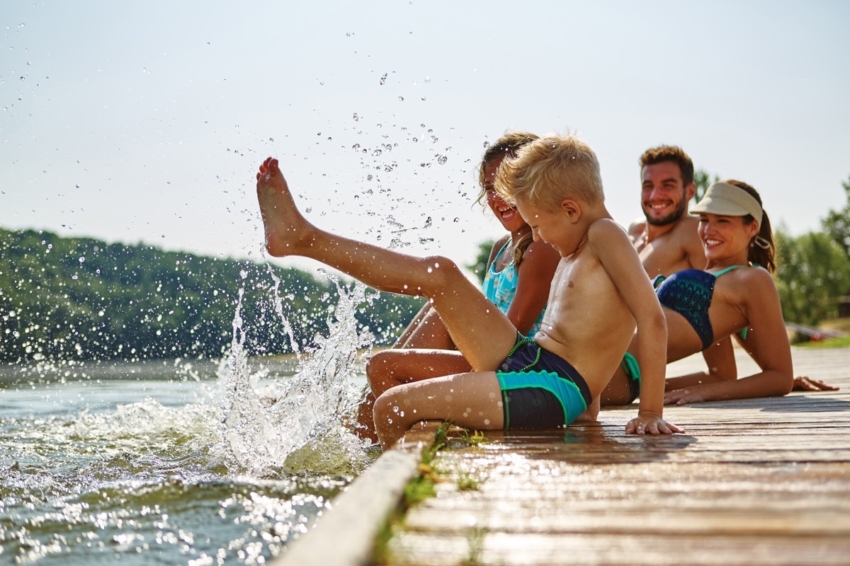 Family Splashing on a Lake