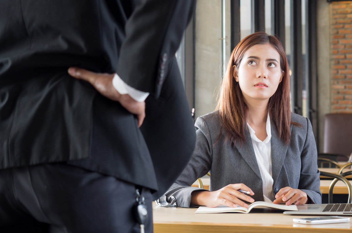 Boss talking down to employee