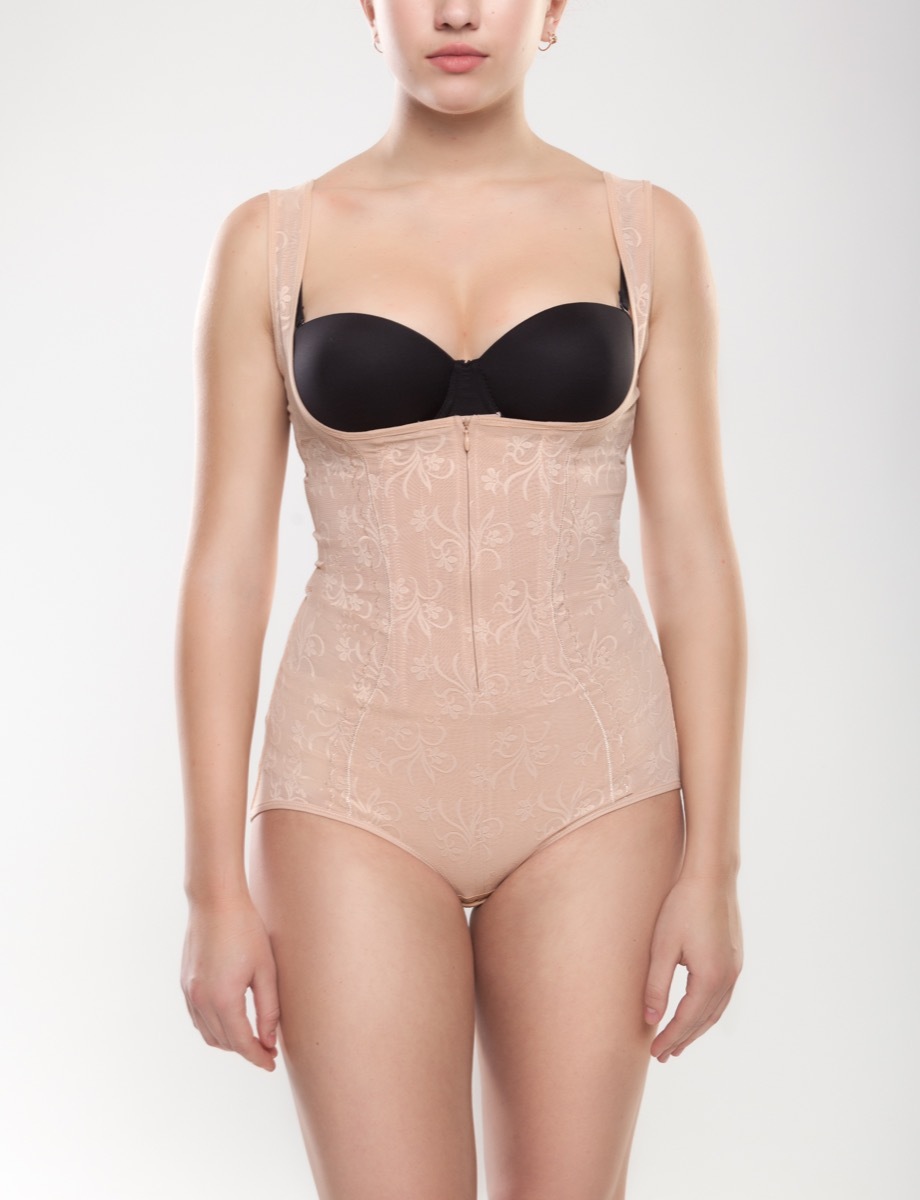 Woman wearing shapewear boring holiday gifts