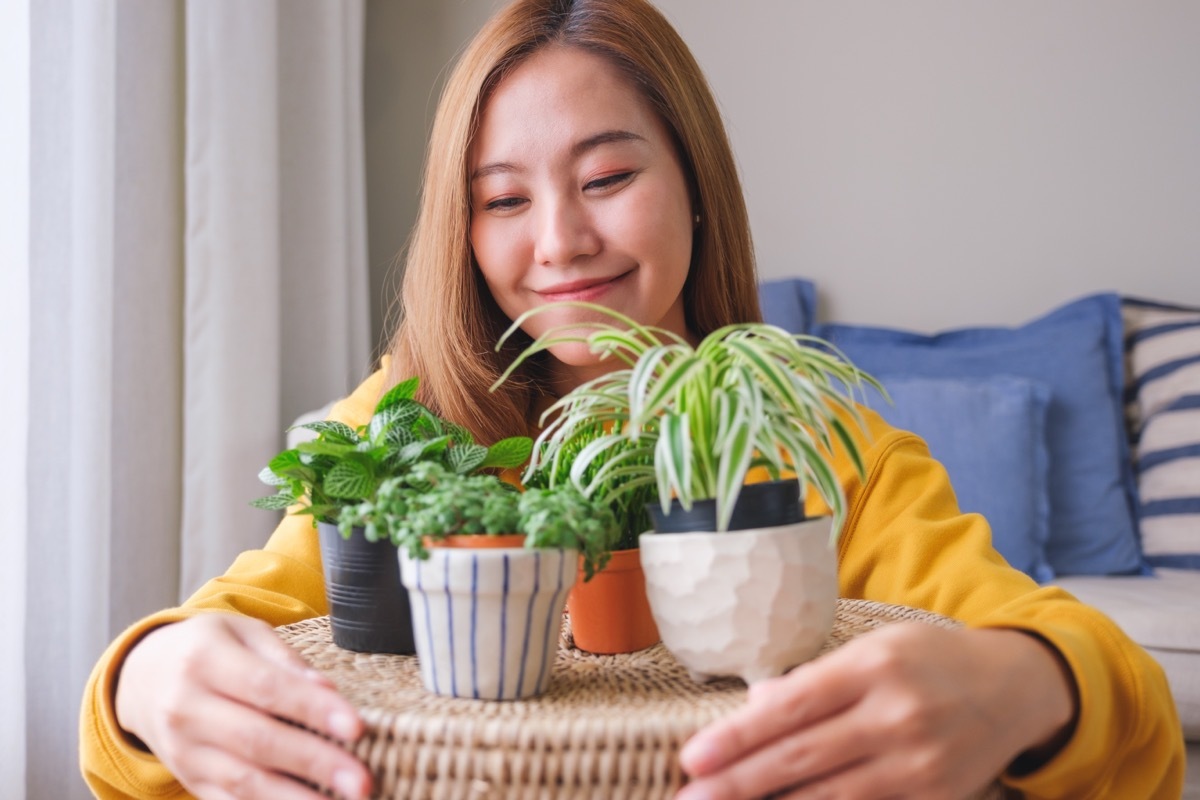 woman with houseplants