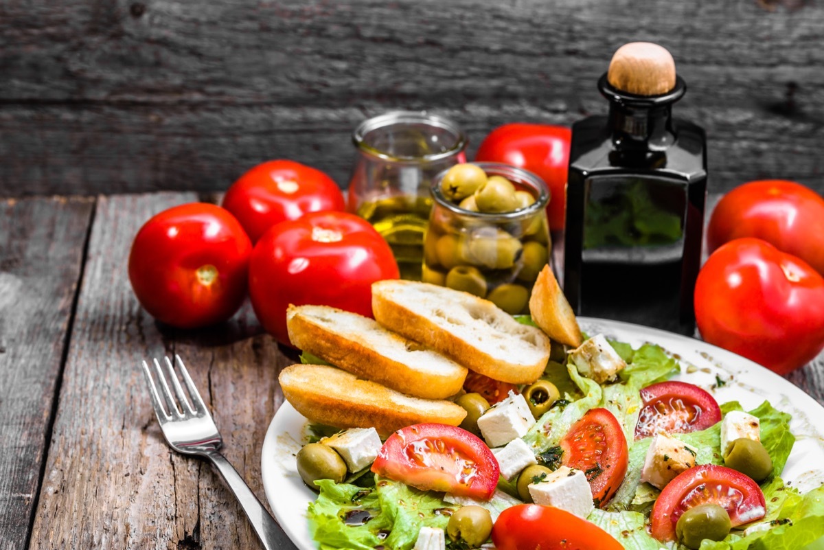 Plate of salad, greek food, mediterranean diet with vegetables and feta