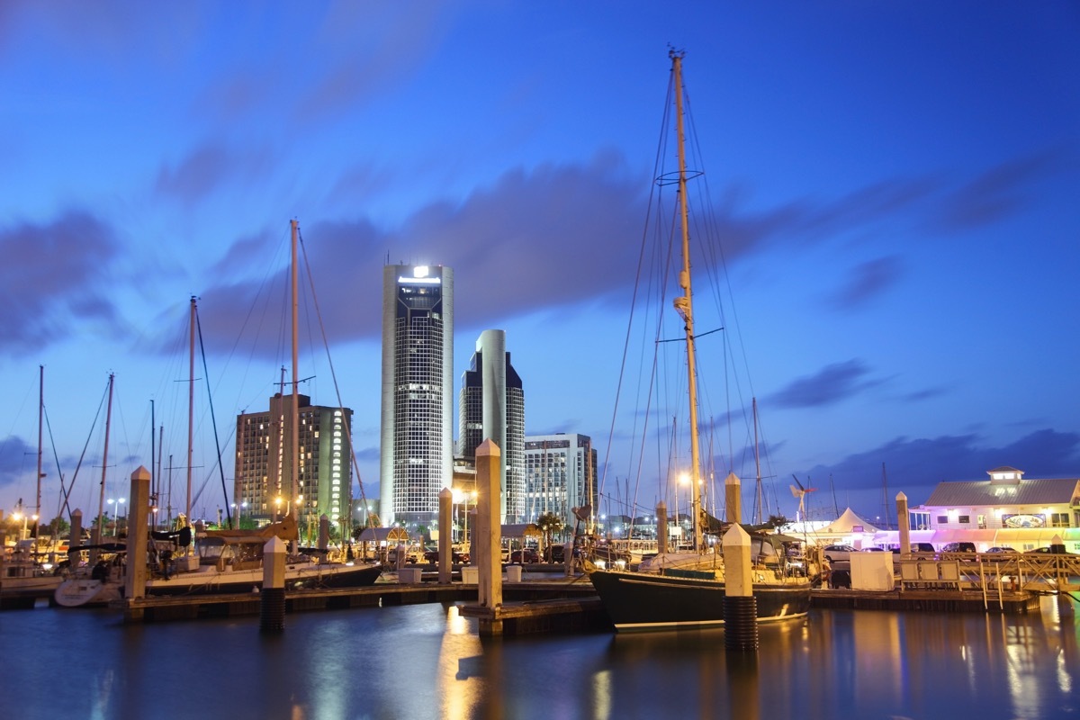 cityscape photo of buildings, boats, and piece in Corpus Christi, Texas