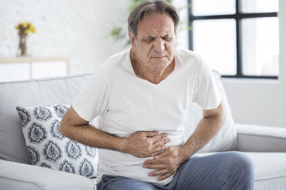 older man with stomach pain, stomach symptoms