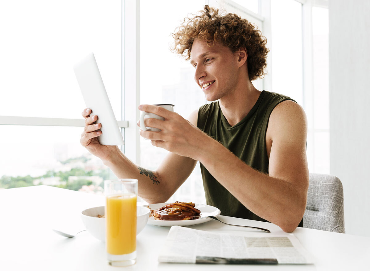 man eating breakfast